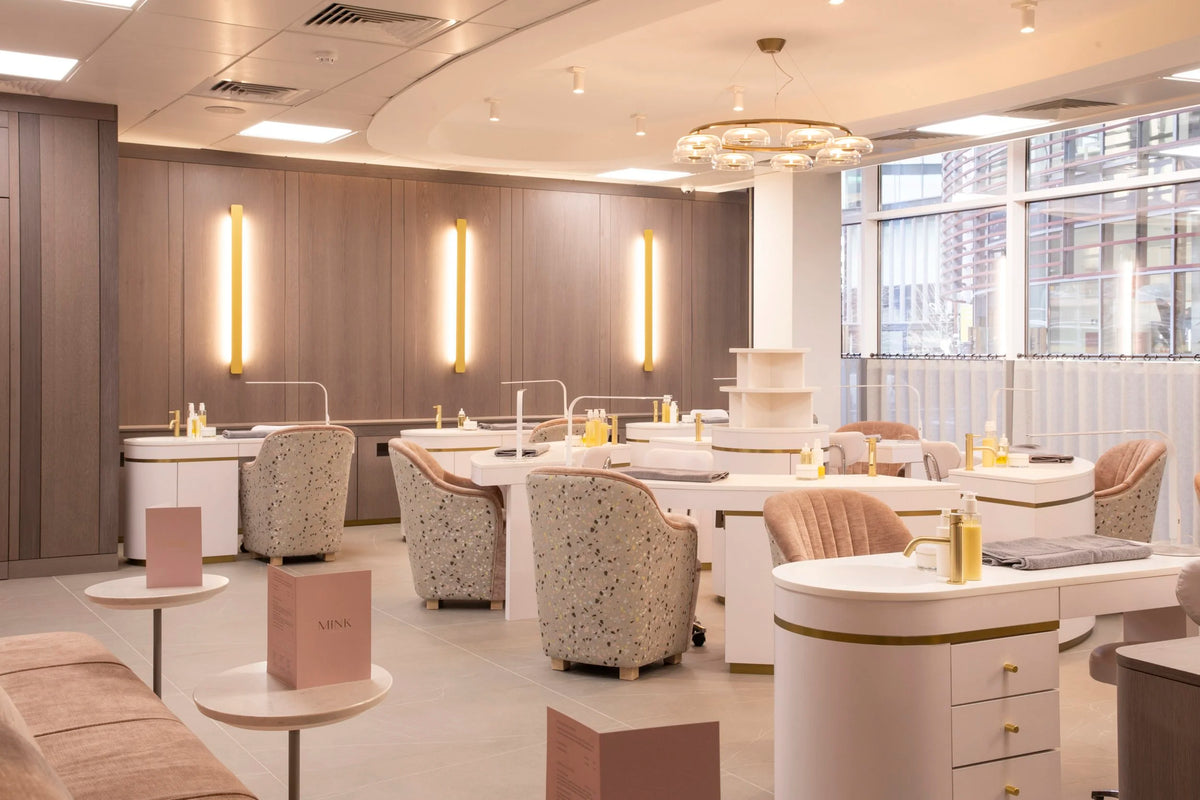 Mink Salon Interior with sinks, mirrors, and decorative elements.